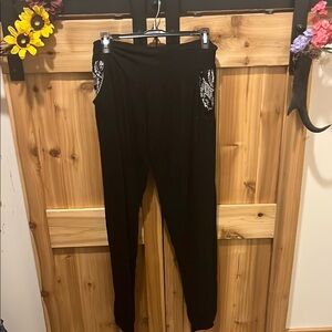 The Elephant Pant Black Joggers with Patterned Accent Pockets